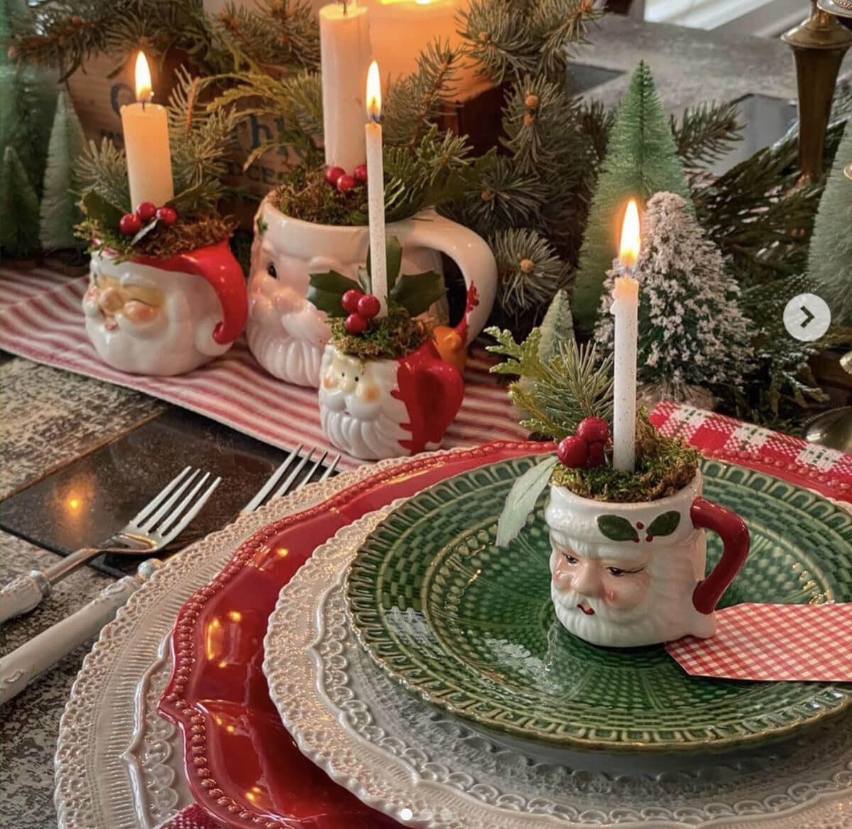 Deck the Halls with Santa Mugs as place settings on a table.