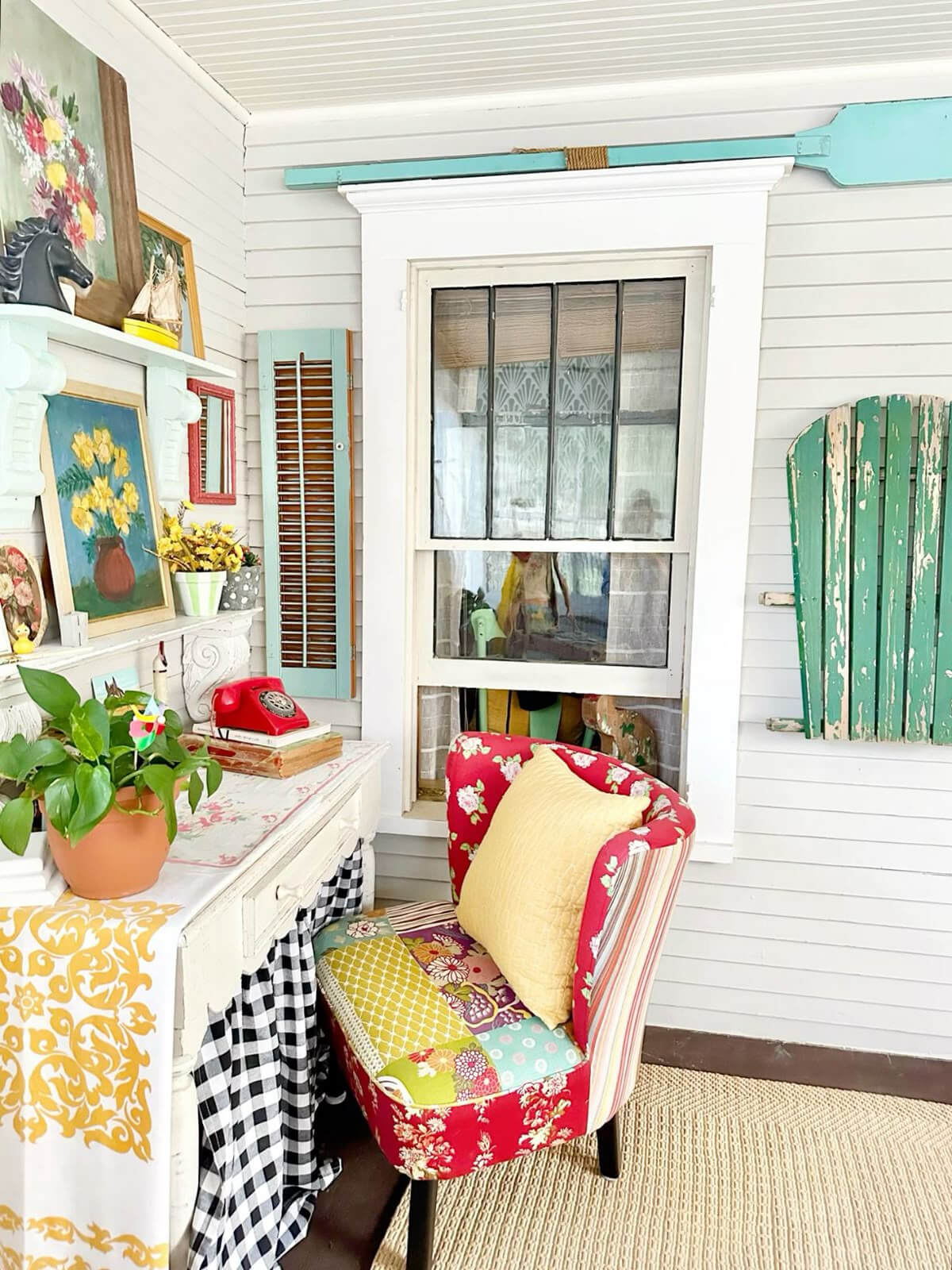 Admiring Decor Without Wanting to Redecorate, though this small space with a white desk and patchwork upholstered chair is adorable.