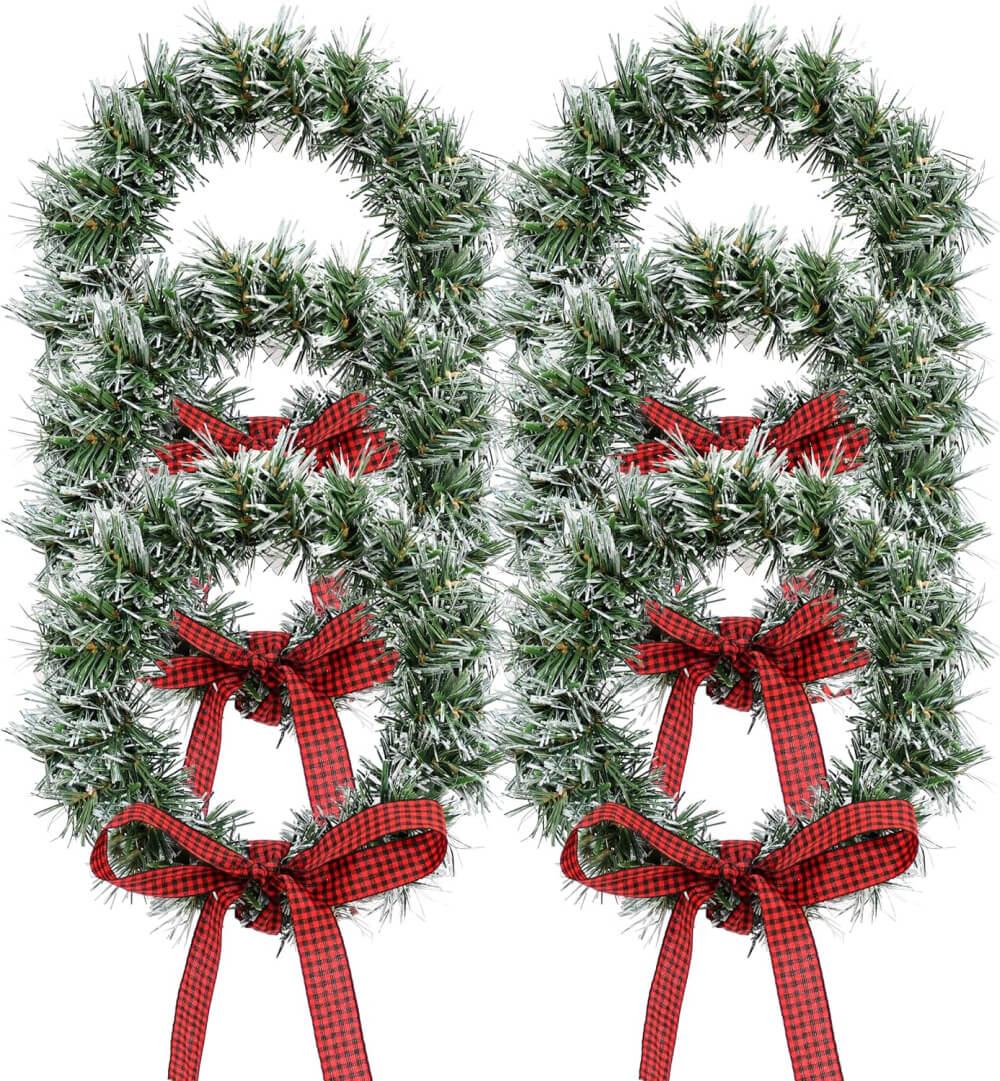 Holiday wreaths for kitchen cabinets with red and black bows at Amazon.