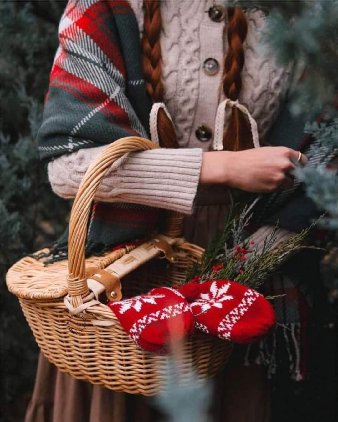 Walking outside with a shawl and gathering nature's gifts in a wicker basket.
