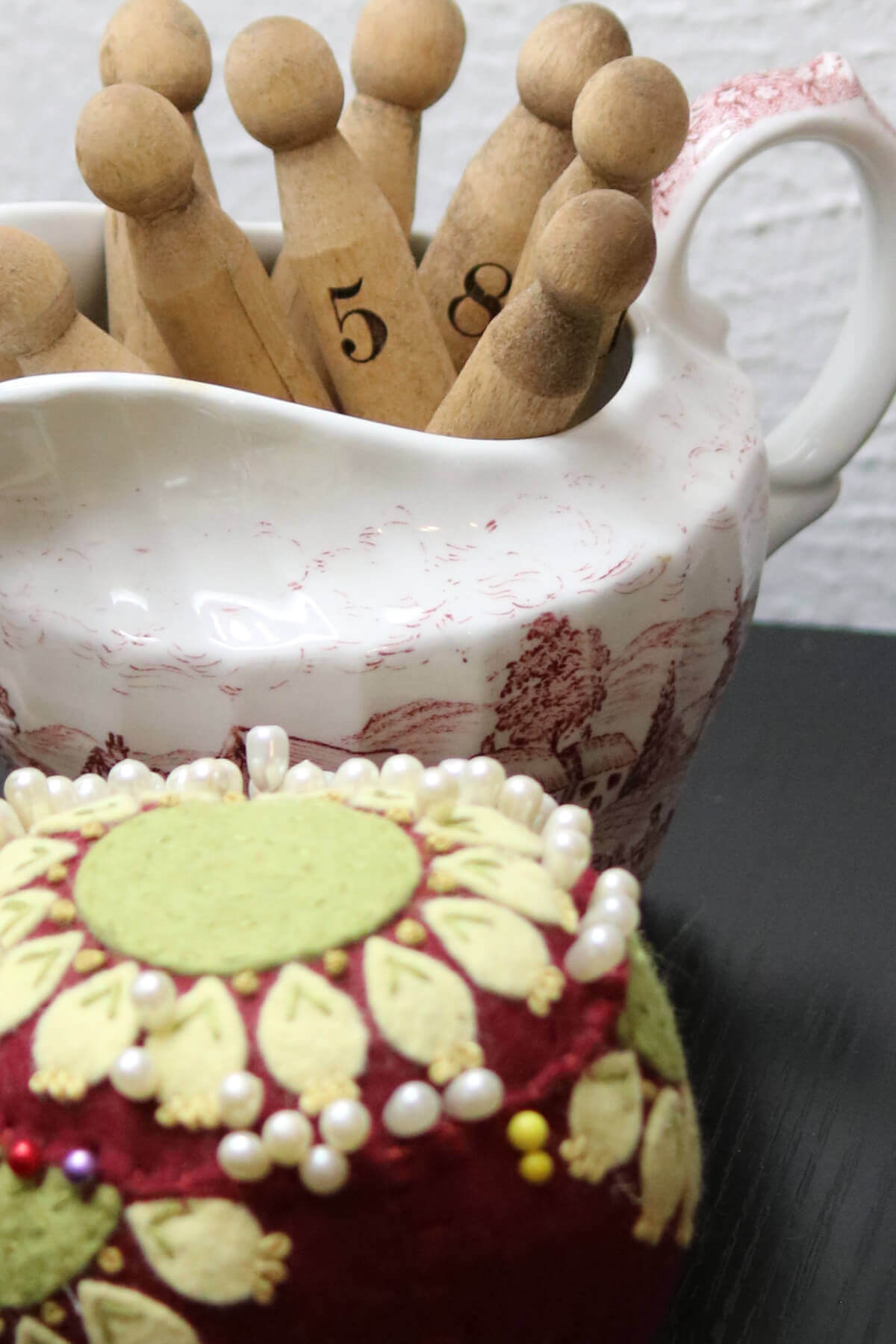 In 12 cozy indoor winter activities, I like to go through my vintage finds and decorate my home with them.