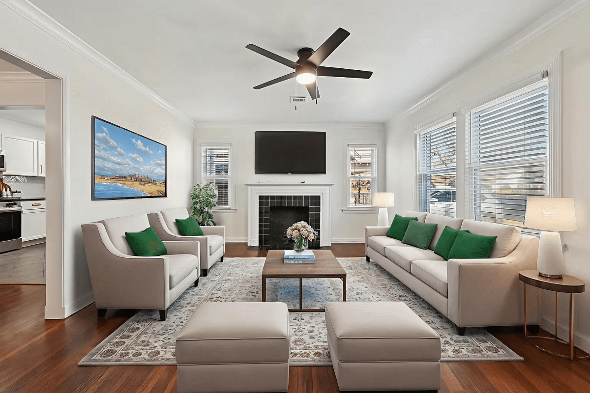 The Renovated Rental House is Finished and has been leased to a couple. The living room has a new paint job.