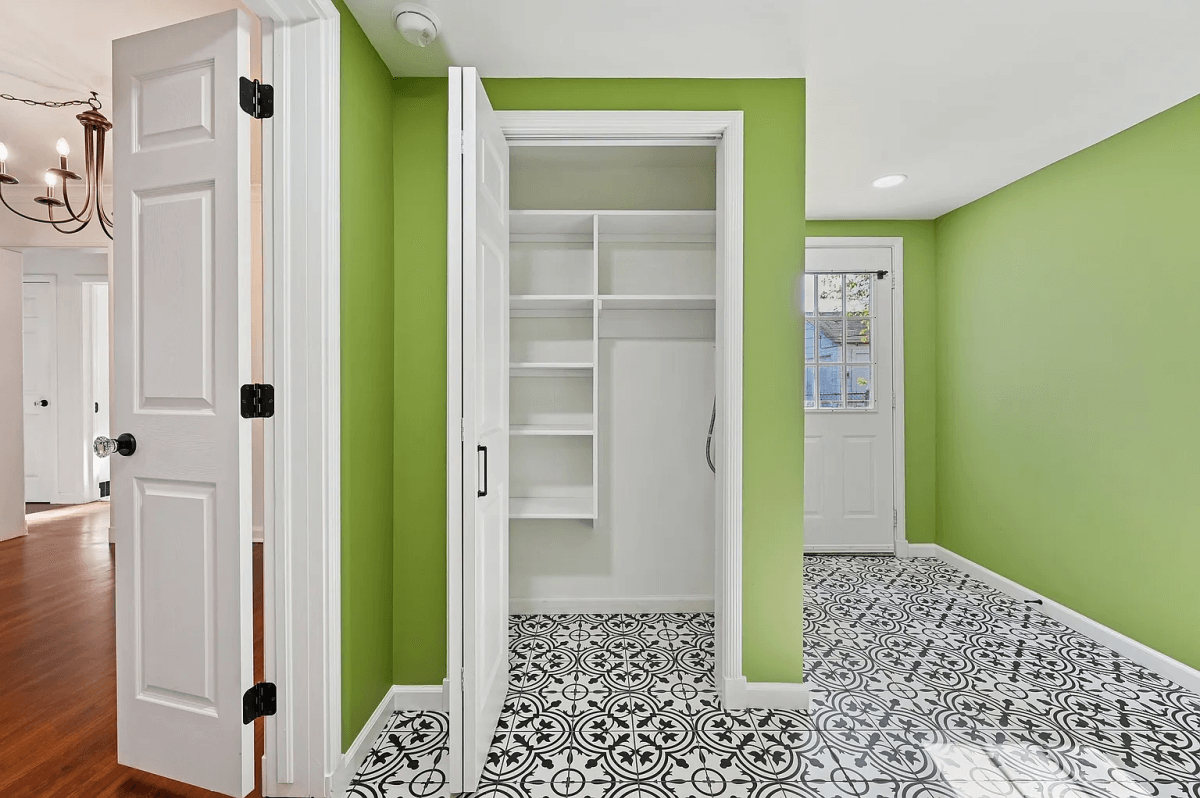 The Renovated Rental House is Finished, and Kendra enclosed the back porch in order to add a laundry room, a linen closet, and a second bathroom.