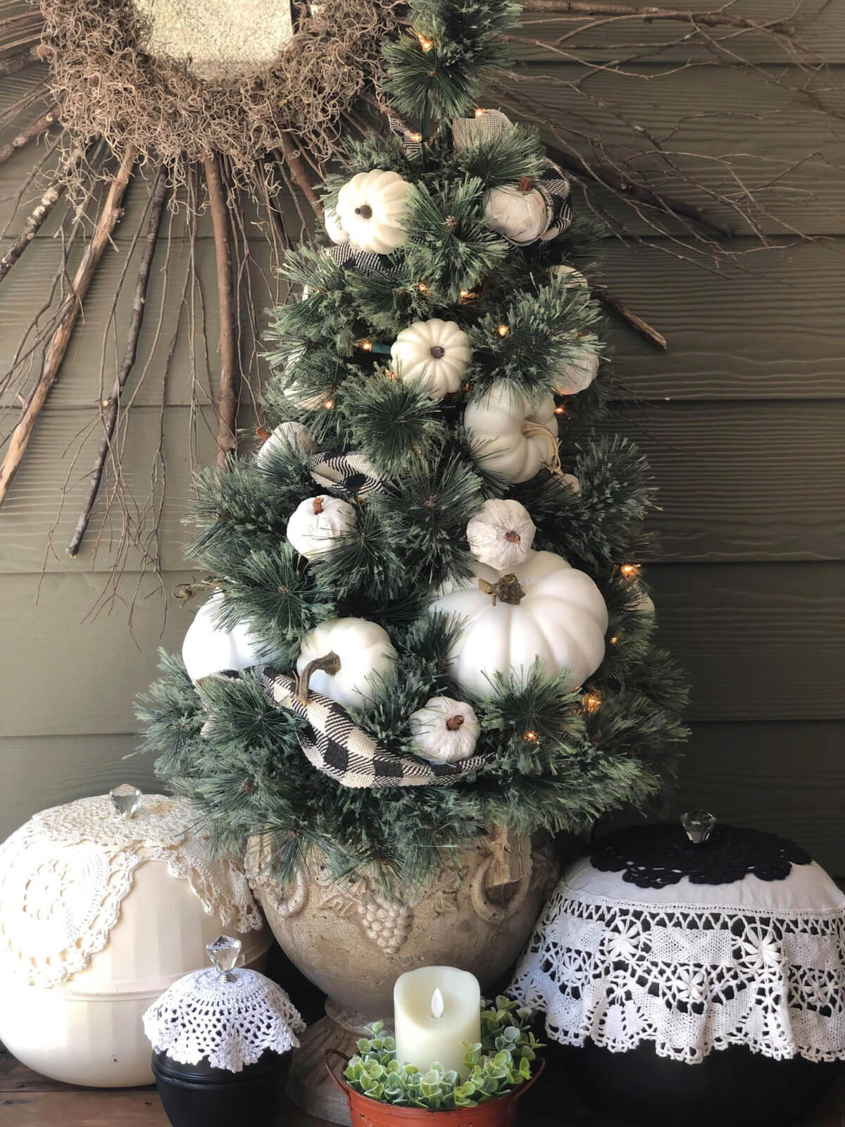 Thanksgiving or fall tree with white pumpkins.