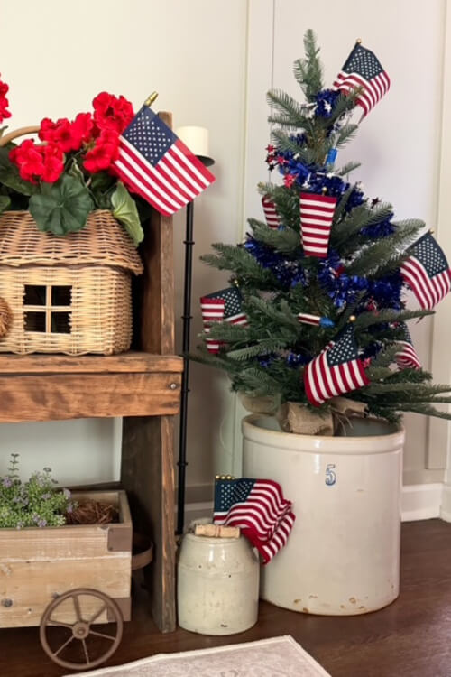 Ideas for year round Christmas trees could include this little tree with flags for the 4th of July. 
