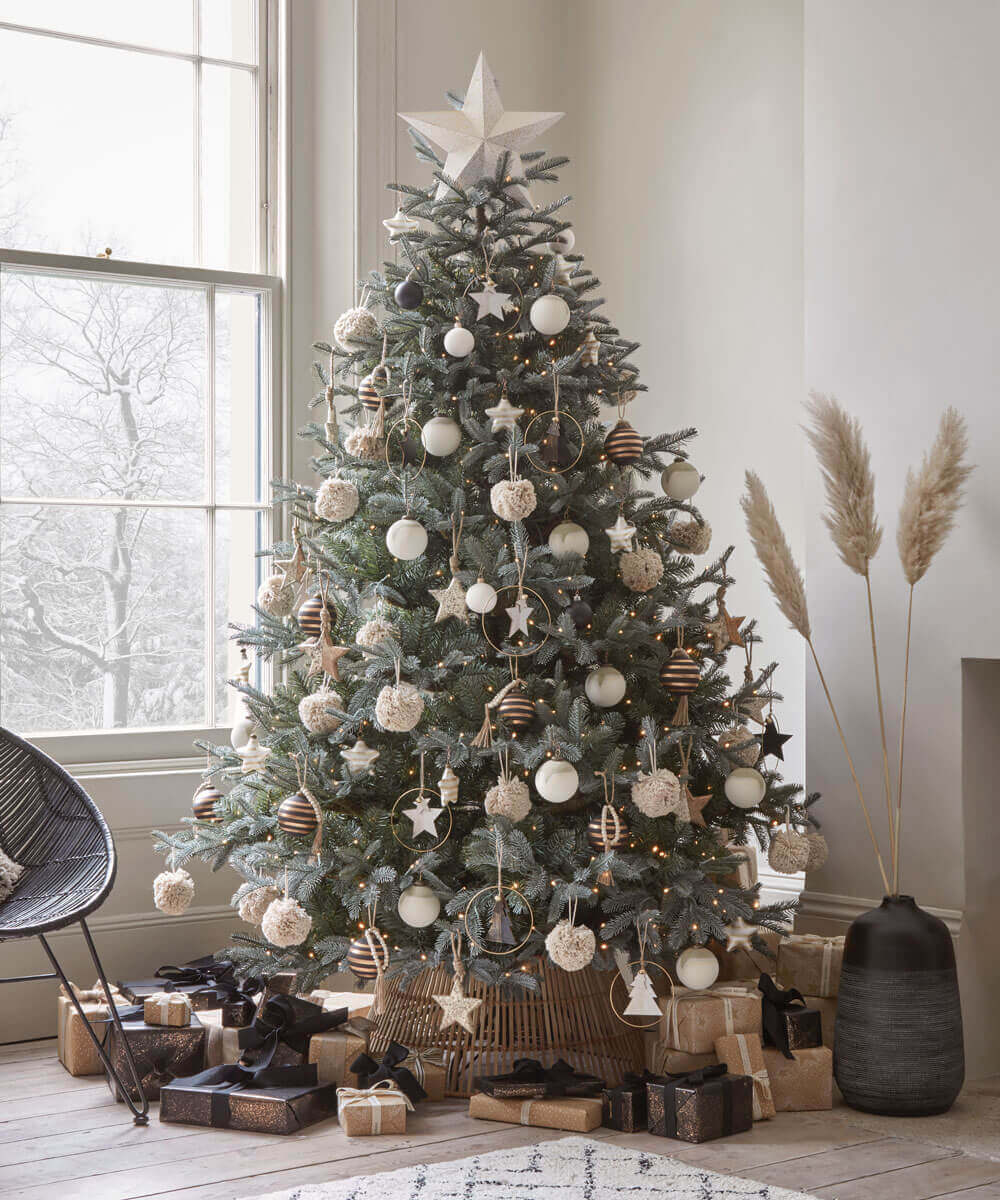 Ideas for year round Christmas trees could include this tree decorated in neutral colors that could also work for winter months.