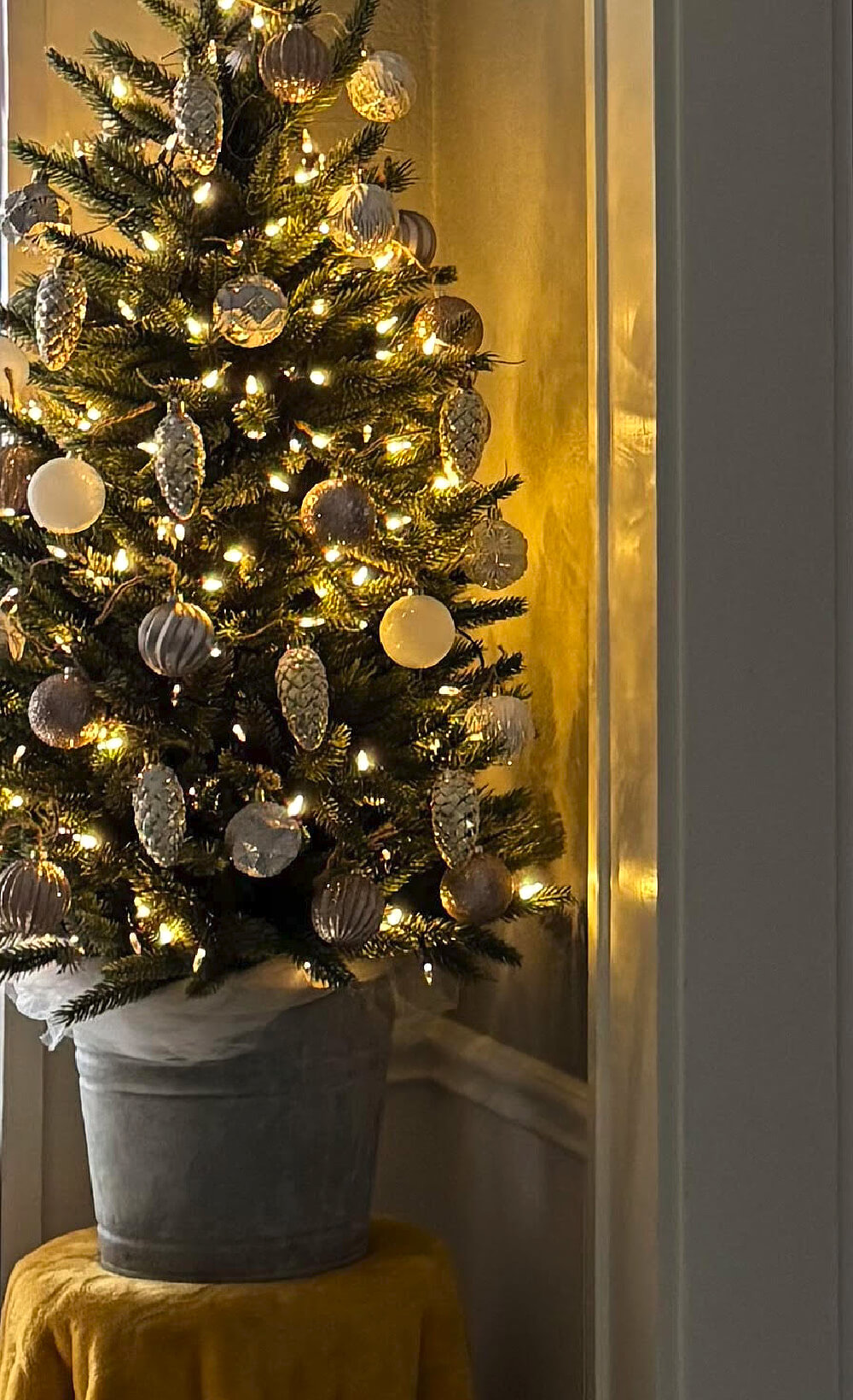 My tree without the wood slices, rag balls, and brown bells.