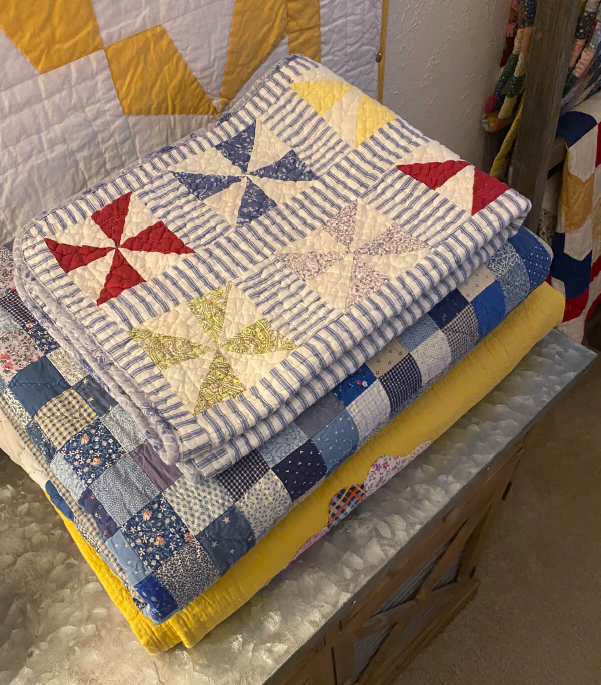 Folded quilts in my home.