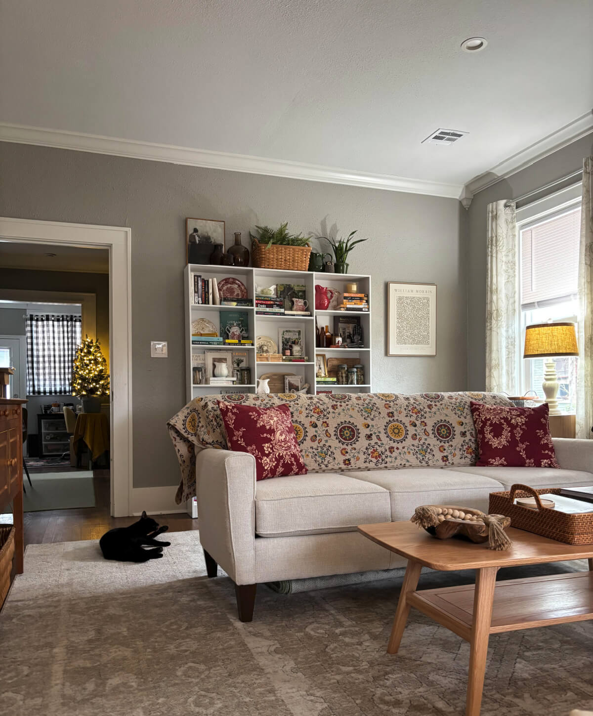 Styling Tips for Bookshelves Behind a Couch is fun. And I added both books and decor, and will add a small light.