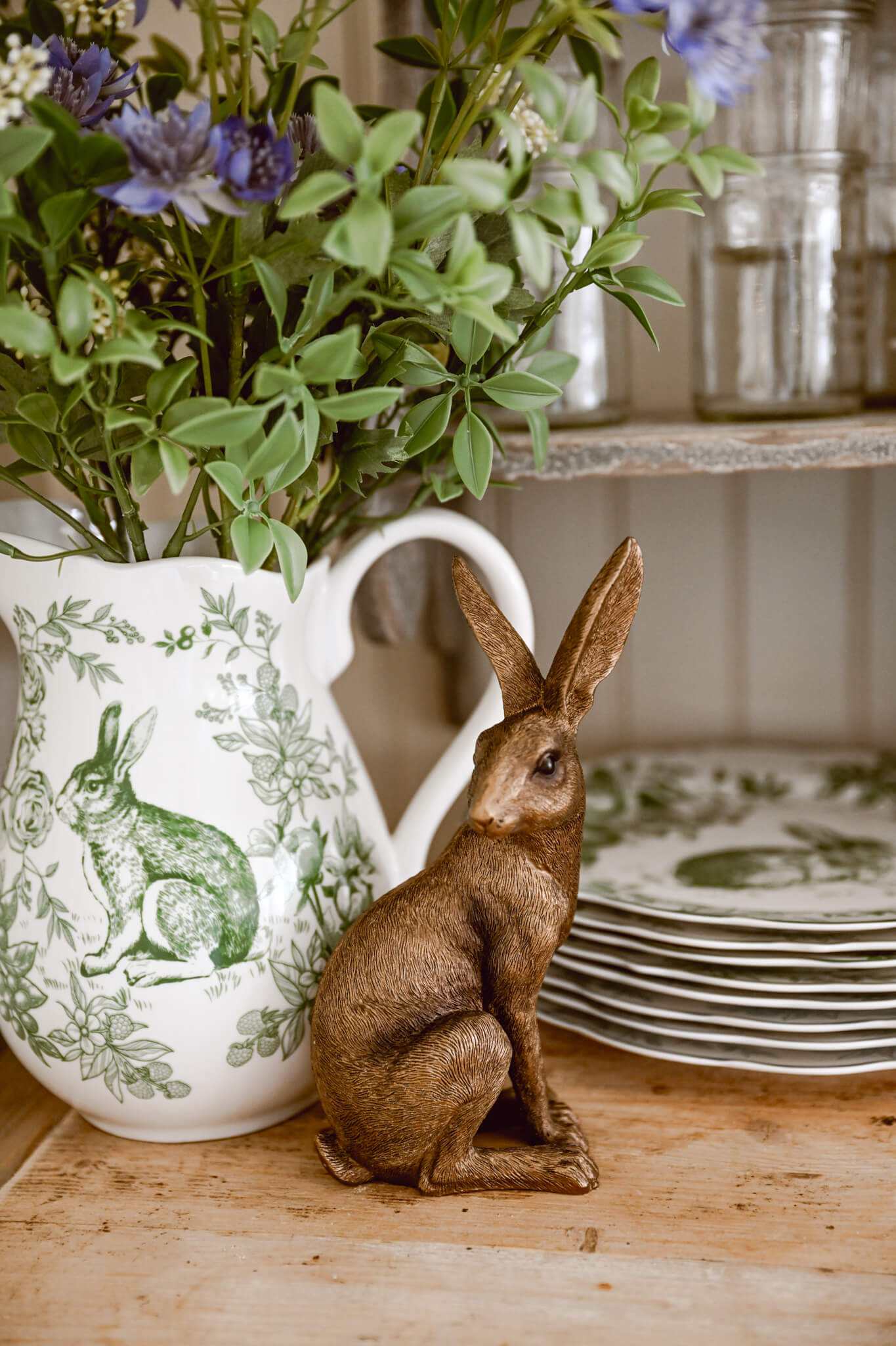 Welcome spring into your home with rabbit dishware and a sculpture.