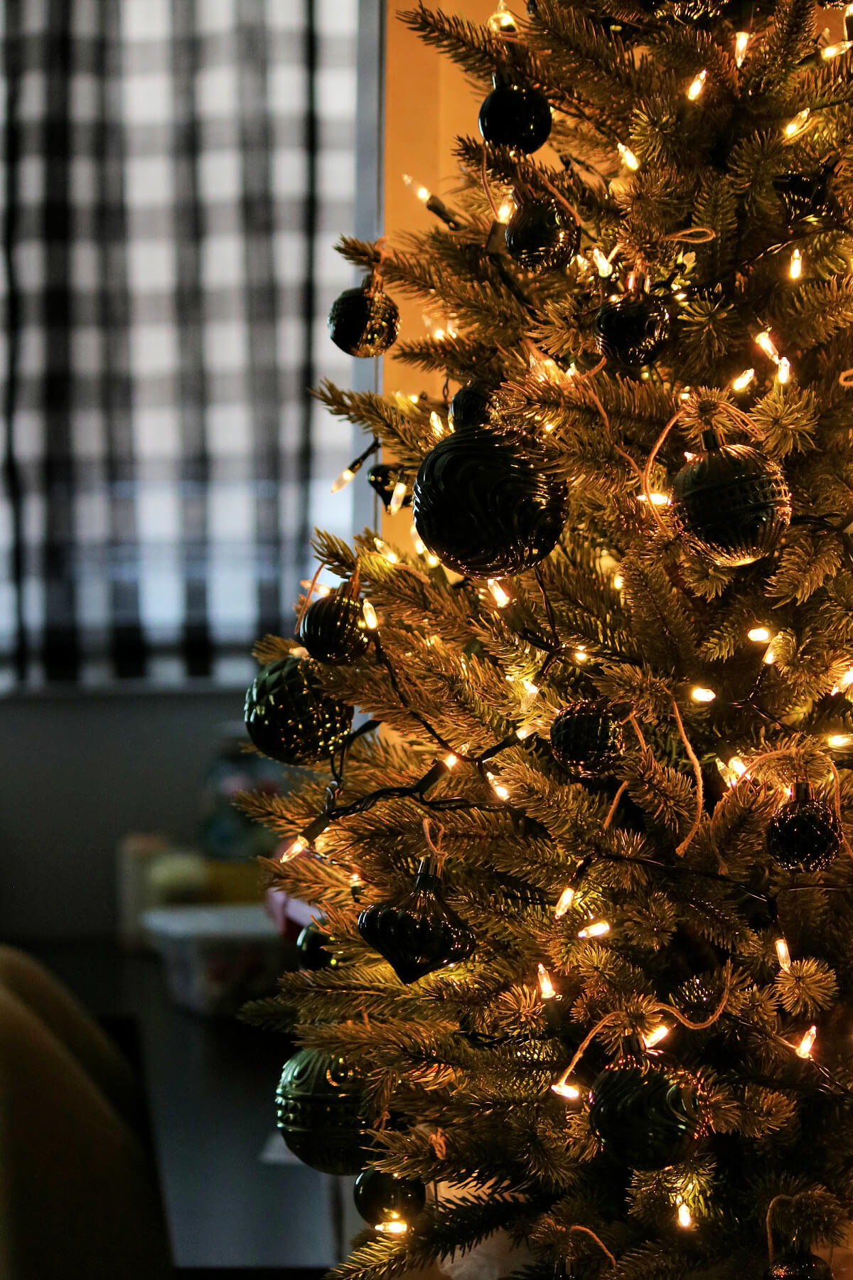 My Spring Decorated Tree has dark green ornaments and lights.