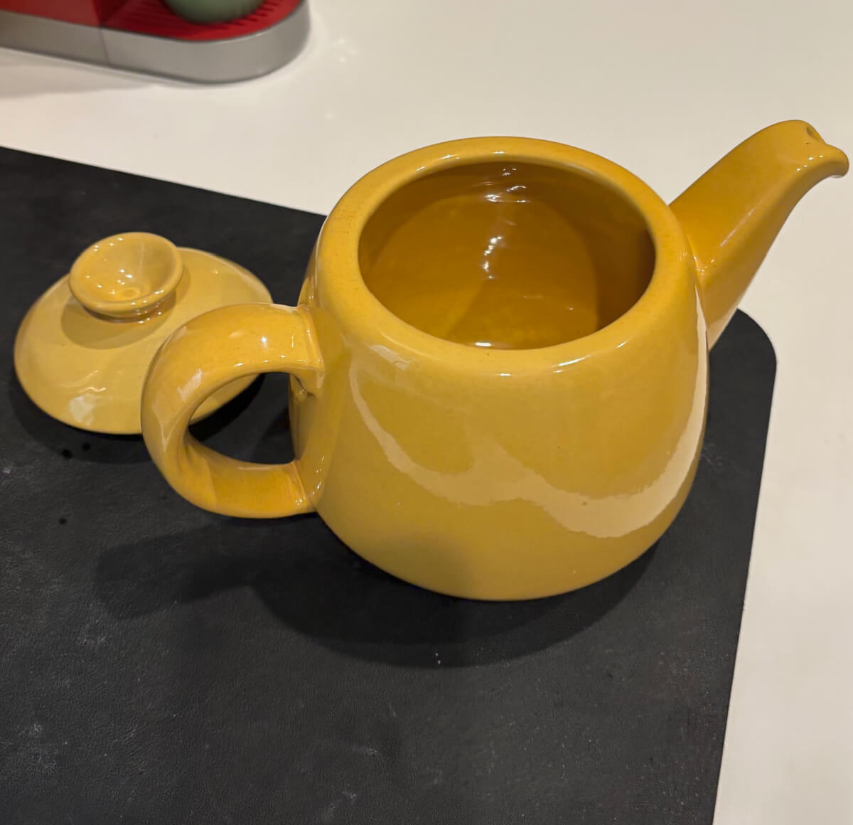 This yellow Frankoma teapot was one of my finds in the hoarder house.
