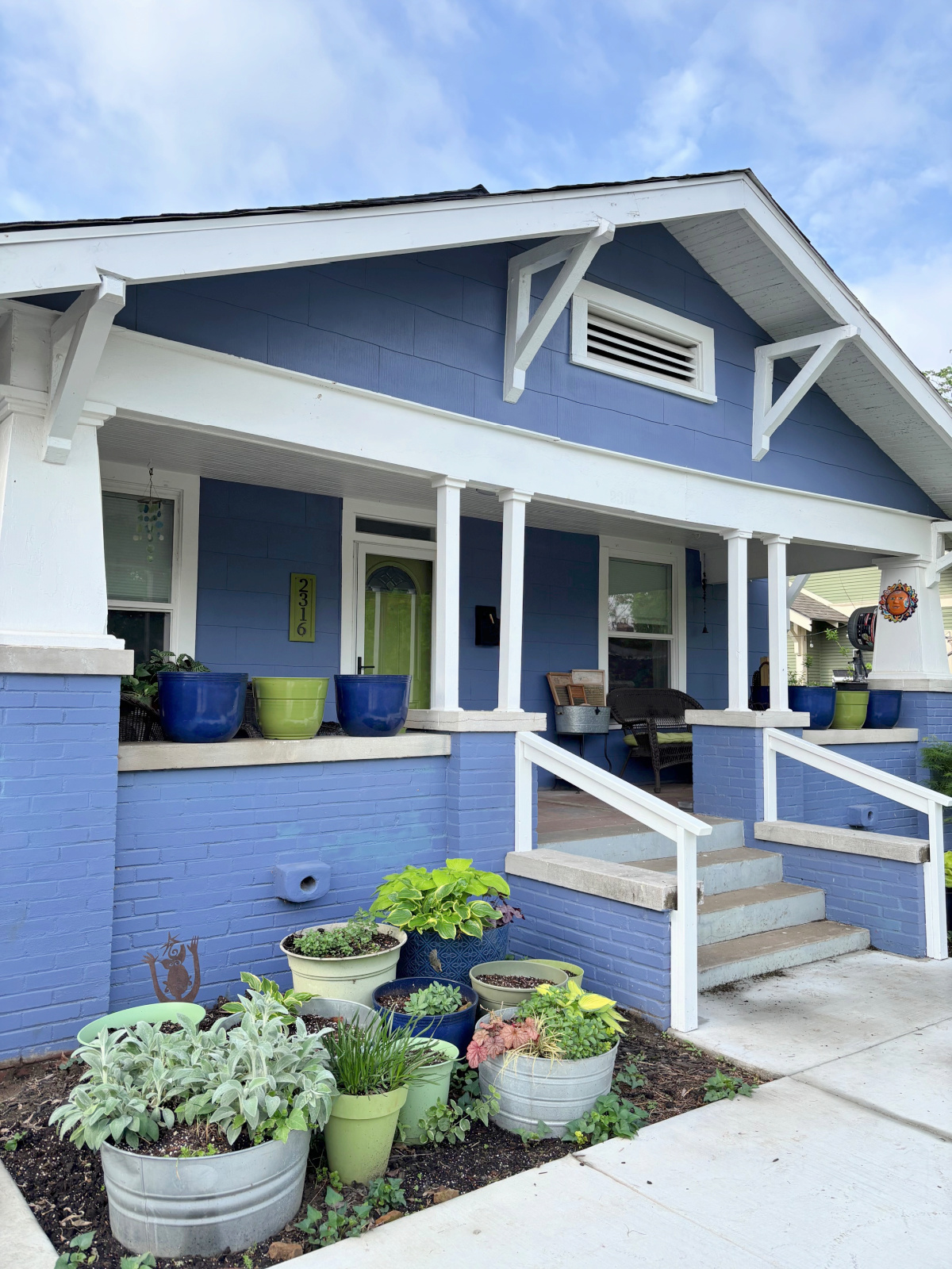 Small changes bit impact with the new storm door and painted railings.