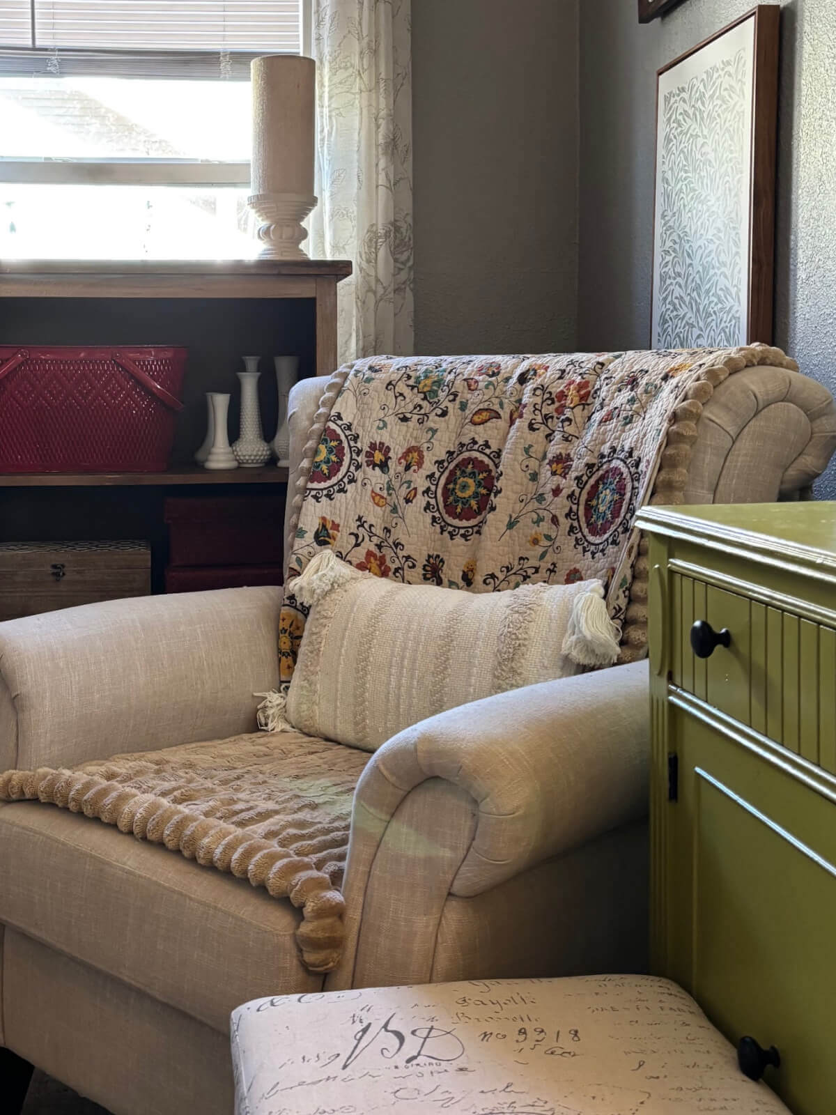 The easiest way to refresh your space is by changing a chair cover and throw pillow.