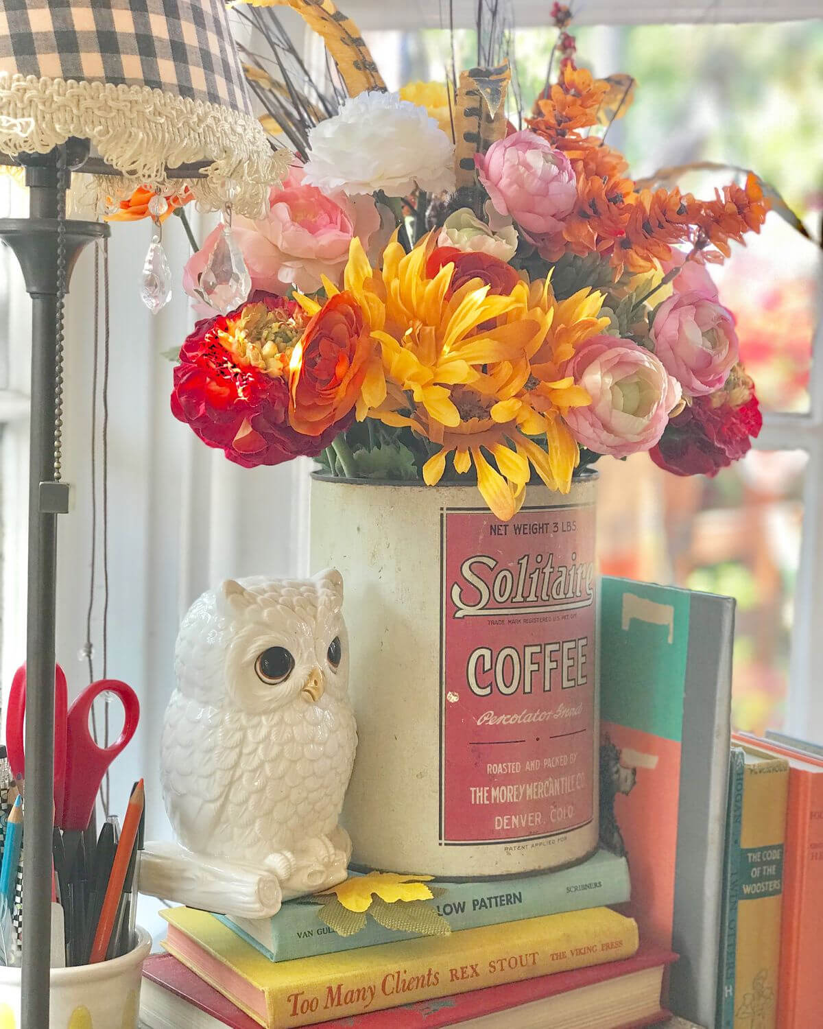 Checks, polka-dots, & stripes look great in a kitchen such as this one with items from flea markets.