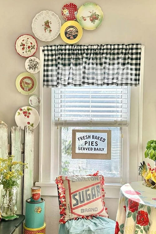 Checks, polka-dots, & stripes look great as curtains. I've mixed polka dotted valances with checked cafe curtains.