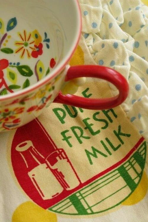 Fun bright colors in a cottage style kitchen setting.