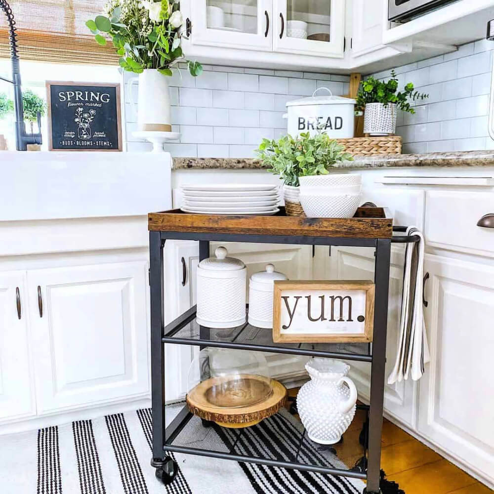 Rolling cart ideas for every room include this kitchen dishware space.