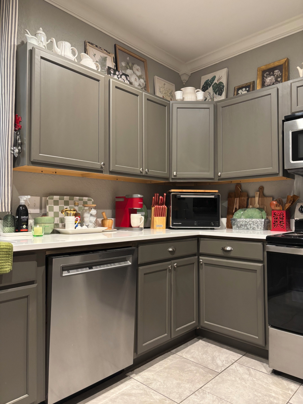 My kitchen with different colored dishes, etc.