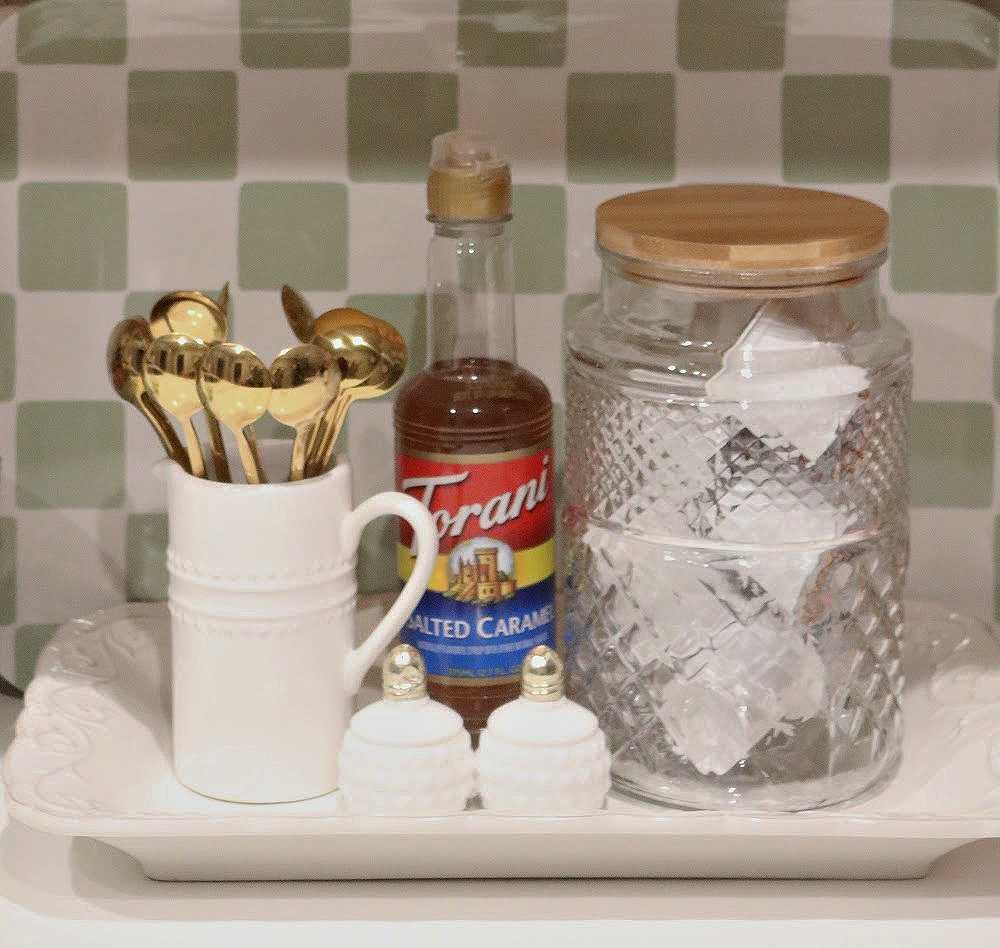 Refresh Your Kitchen with a Simple Color Switch like adding a different colored tray to hold things on your kitchen countertop.