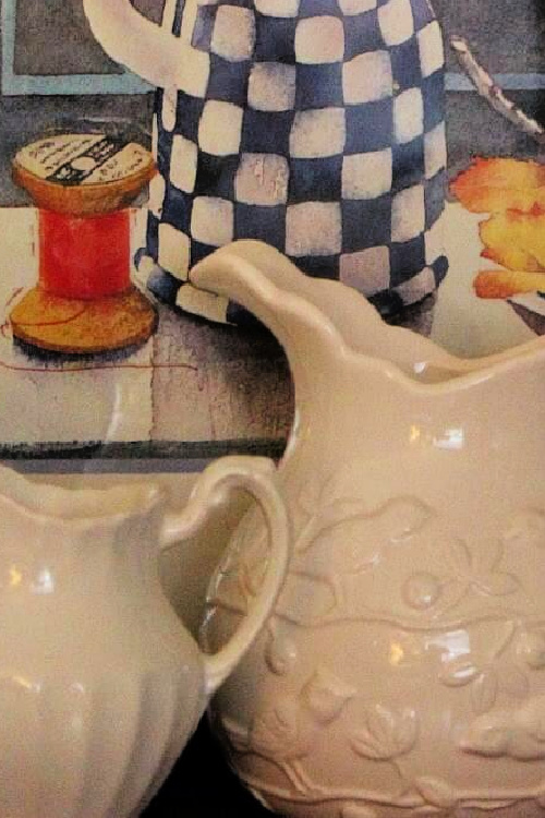 When decorating with vintage treasures, look for unique markings on pitchers.