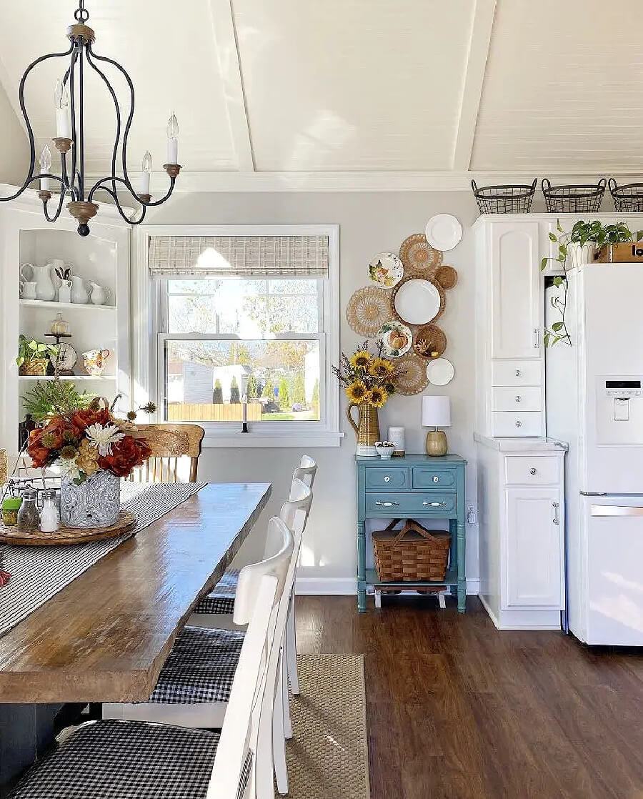In how to style space above kitchen cabinets, this one is decorated with wire baskets.