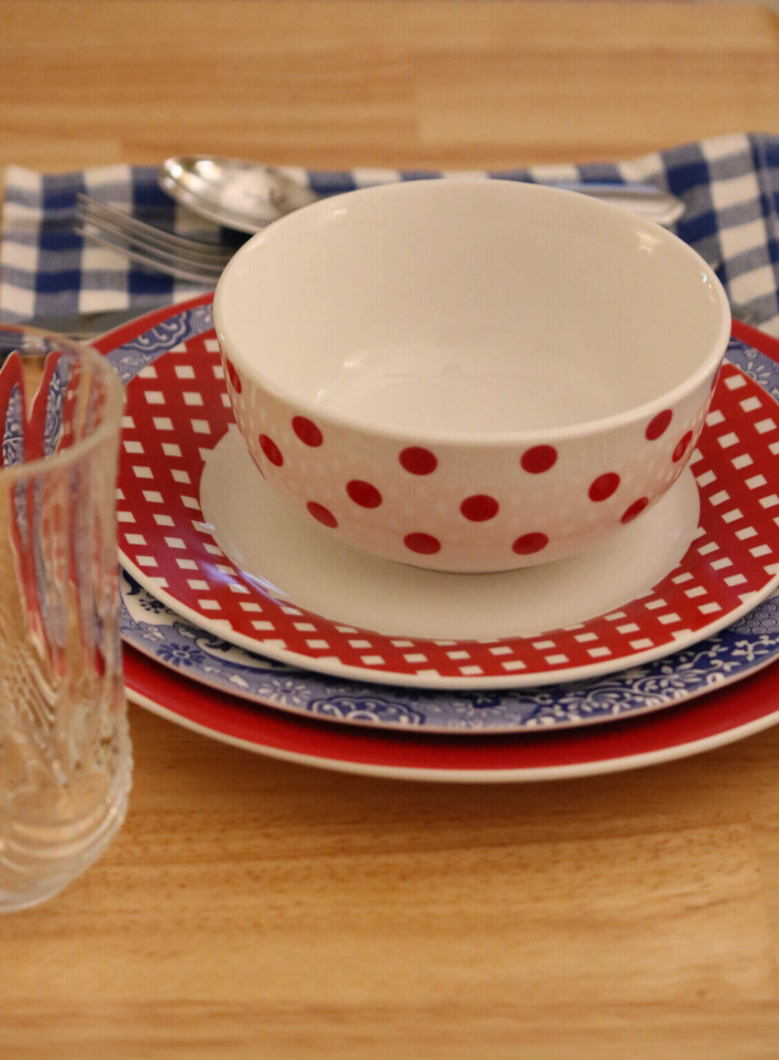 A table setting or red, white, and blue dishes.
