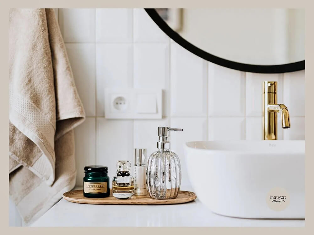 A minimal wood tray to hold bottled soap, etc.