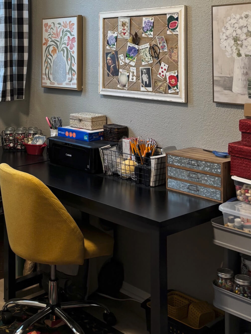 My small office area with two black tables filling in as desks, and what's on top is organized well.