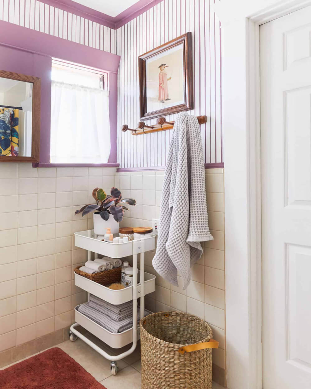 In 26 Bathroom Storage Ideas for Small Spaces, use a rolling cart for storage.