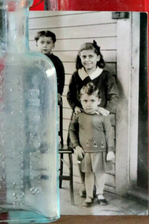 When decorating with vintage treasures, look for old photos of people you never knew.