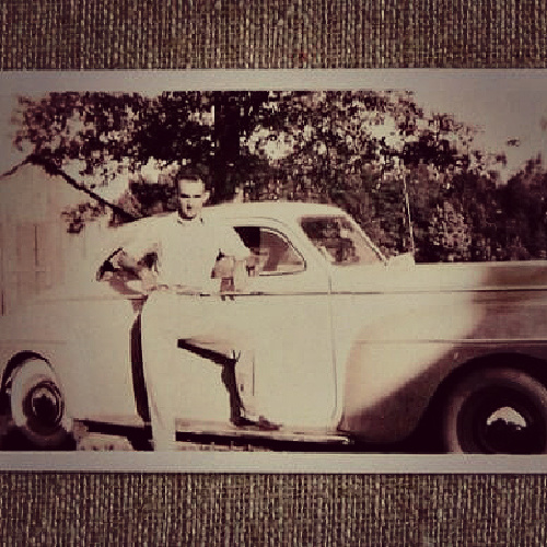 Summing up life in the 1960s, this is my father in front of a car.