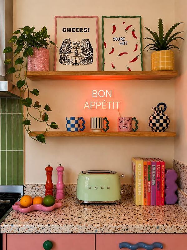 Mugs on wall shelf.