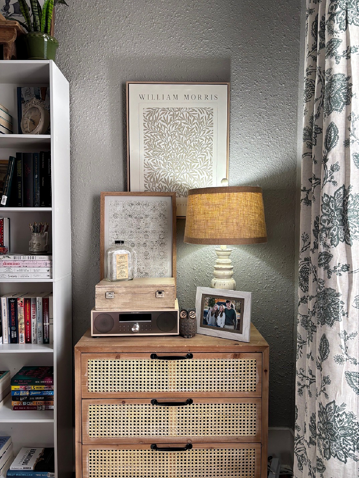 Create an airy Living Room with Easy Decorating Tips by changing the colors and paintings to lighter hues.
