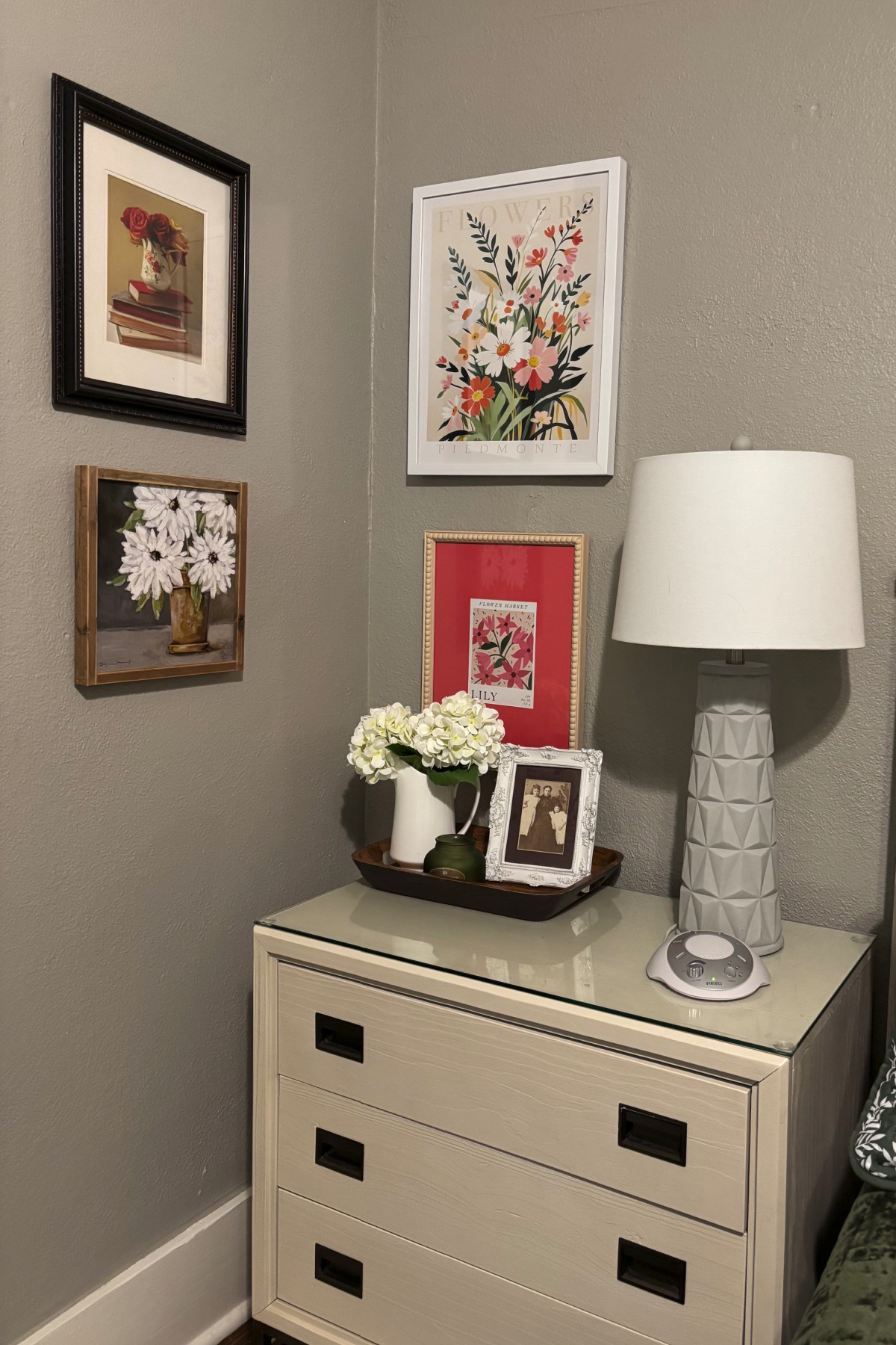 I created my serene green bedroom by using greens from the paintings. This is the other side of my bed with one of the small dressers I use as a night stand.
