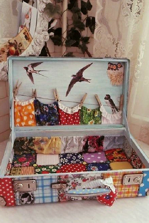 22 ideas to repurpose vintage suitcases includes this colorful patchwork vessel.