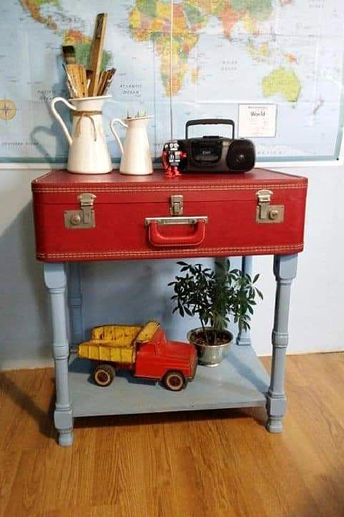 22 ideas to repurpose vintage suitcases includes this red top with blue legs.