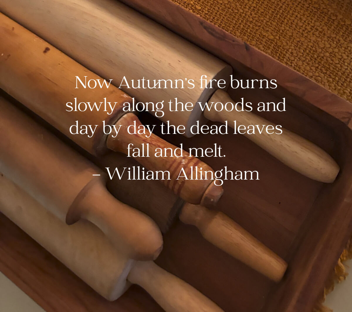 A wooden platter with rolling pins.