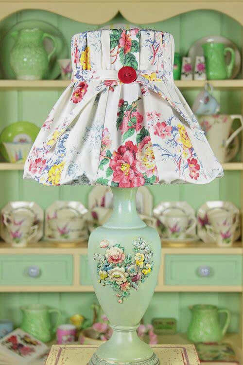 A vintage lamp with a fabric shade.