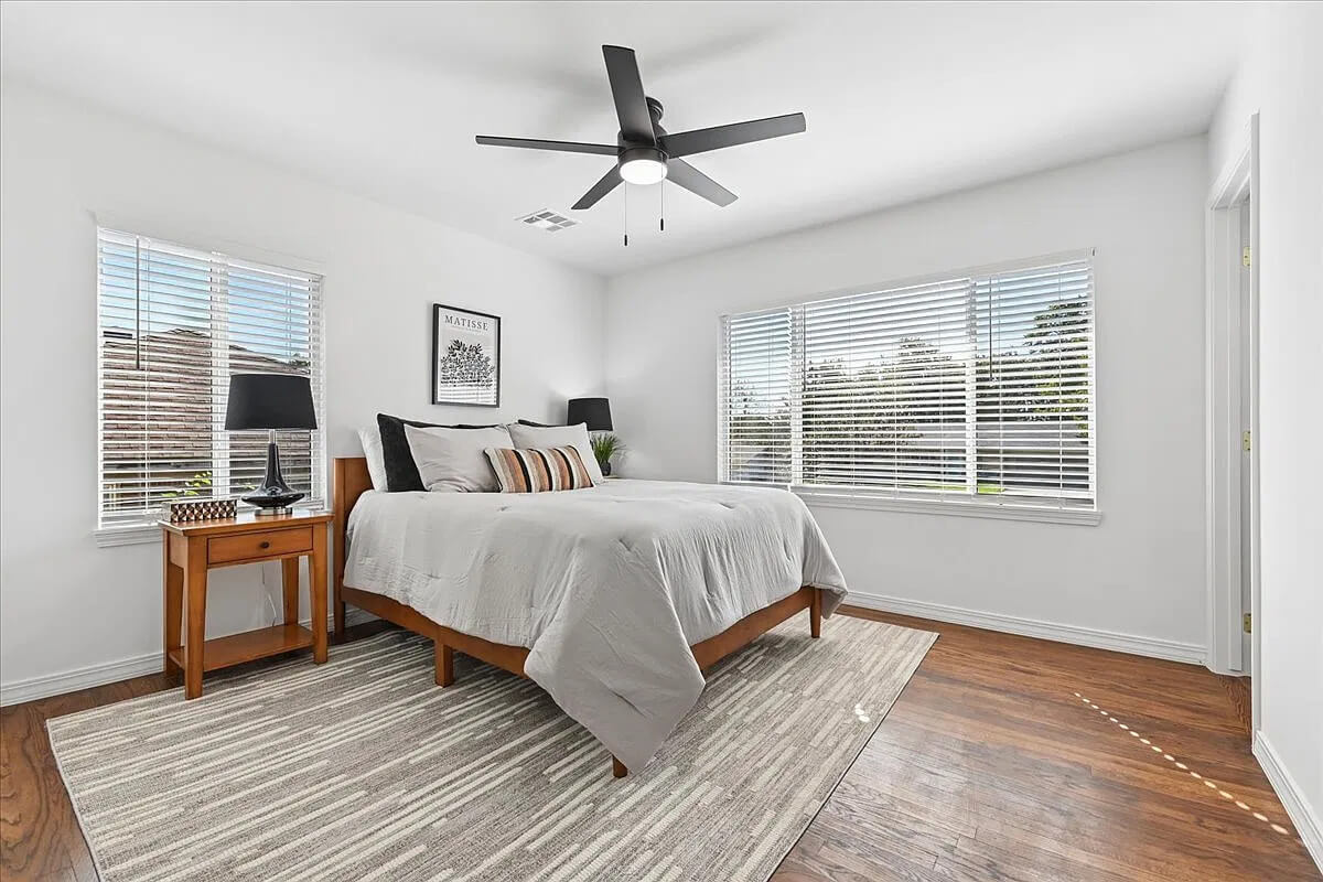 The hoarder house has been transformed, and this is the staged master bedroom.