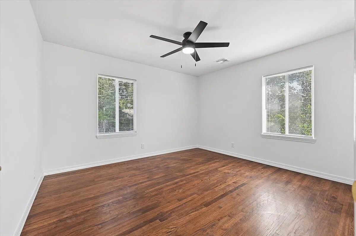 The hoarder house has been transformed, and this is one of the three bedrooms.