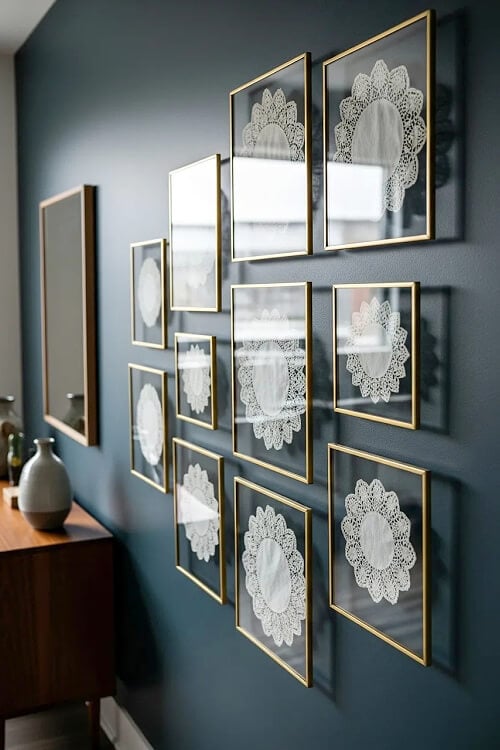 Frame doilies in picture frames under glass.