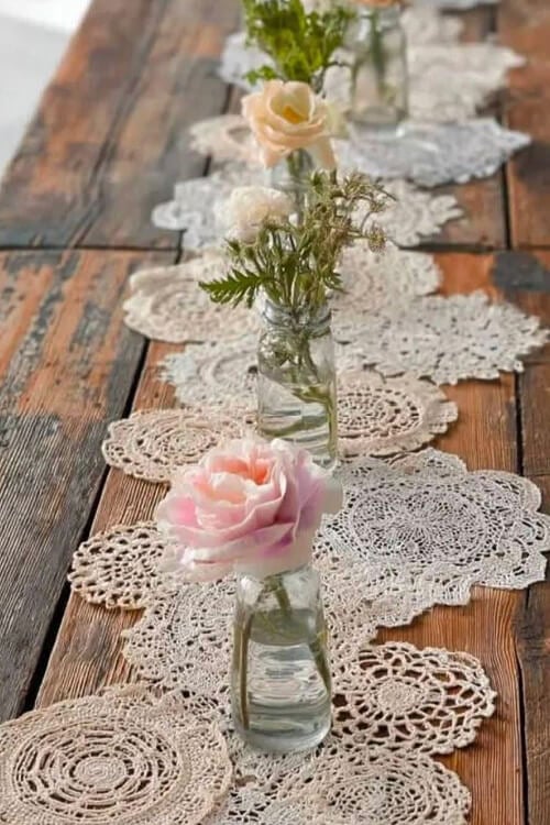 Layer crocheted doilies to create a table runner.
