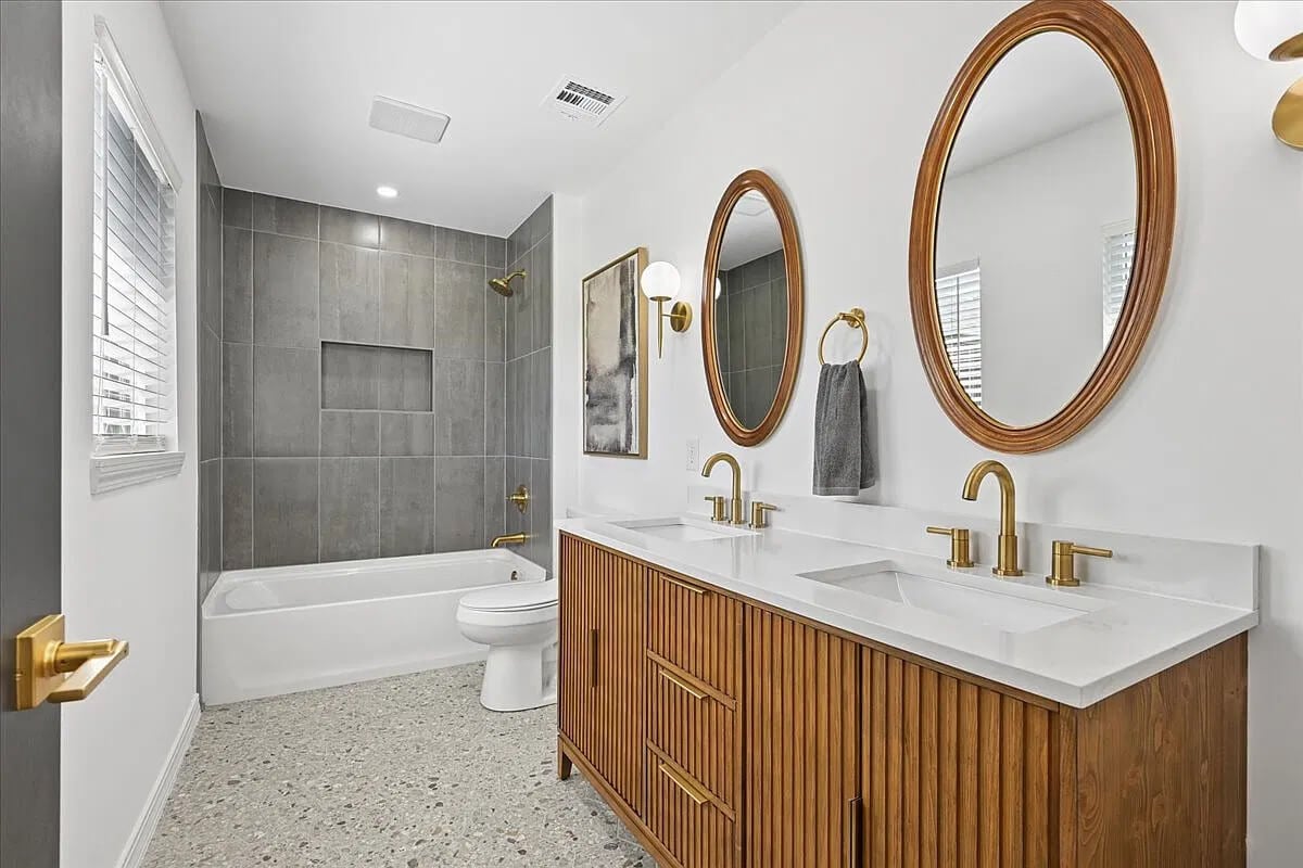 The hoarder house has been transformed, and this is one of the bathrooms.