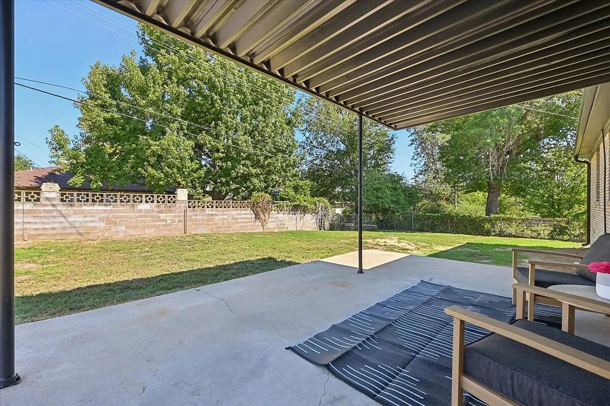 The covered back porch and yard.